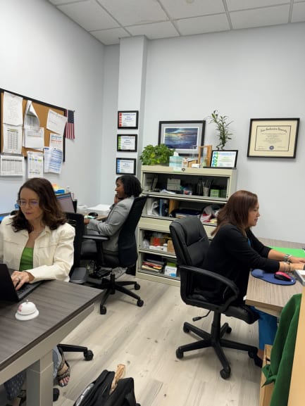 The Insure With Mercy team at work in their Florida office