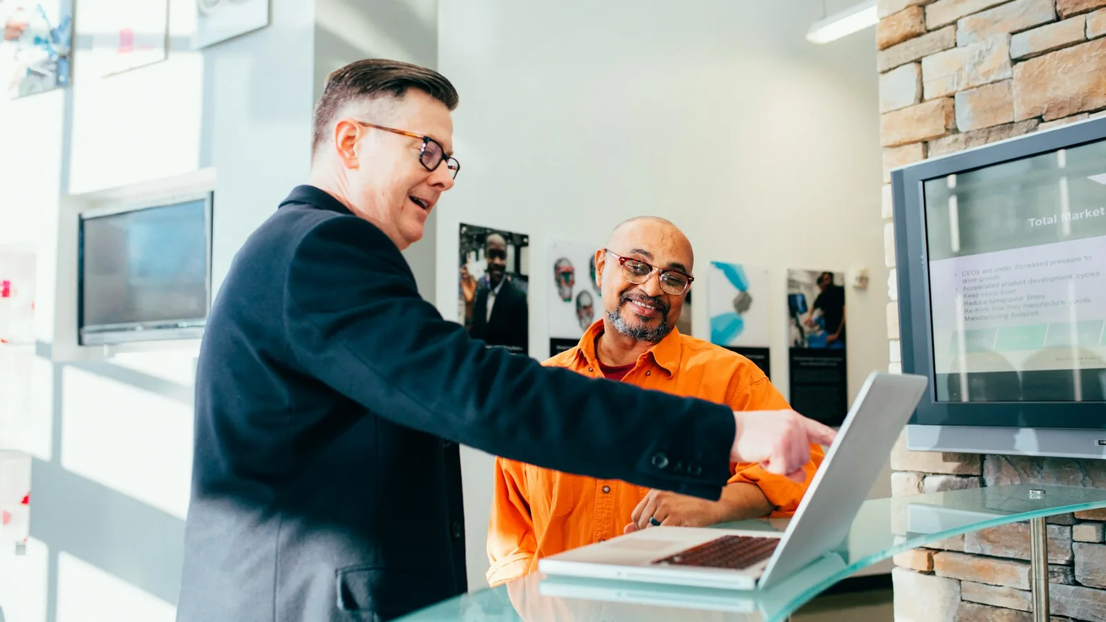 Person comparing health plans on a laptop